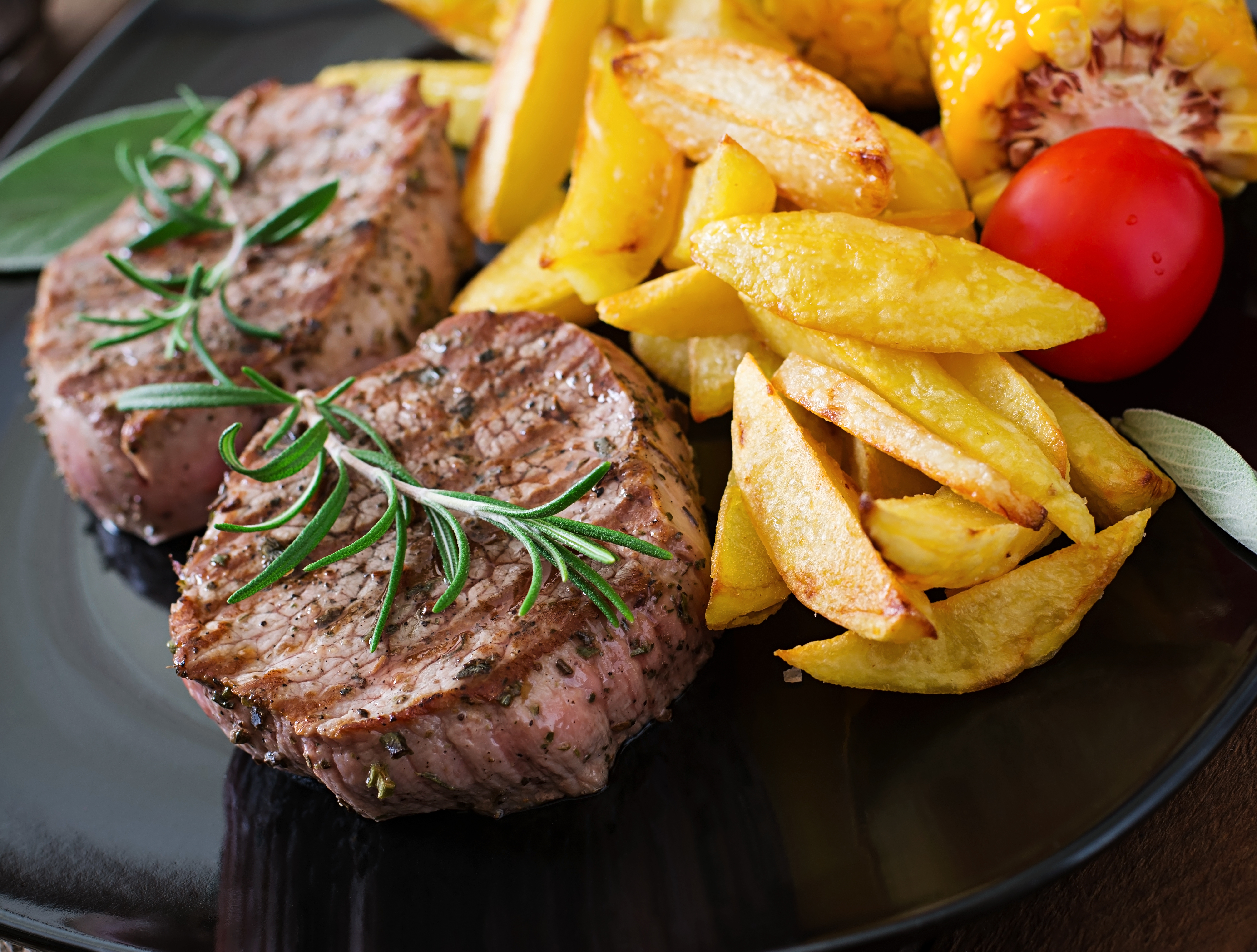 tender-juicy-veal-steak-medium-rare-with-french-fries.jpg